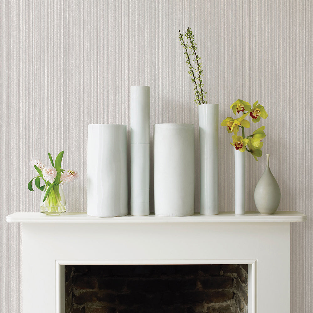 Faux Grasscloth Removable Wallpaper - A white fireplace with plants and white vases in a room featuring Faux Grasscloth Peel And Stick Wallpaper in textured sterling silver | Tempaper#color_textured-sterling-silver
