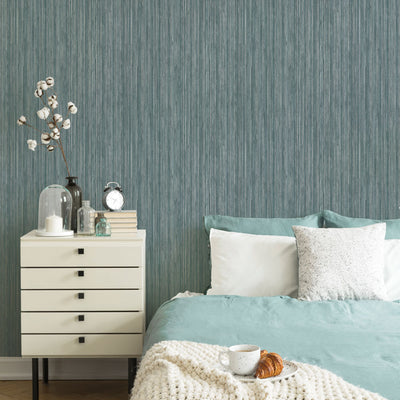 Faux Grasscloth Removable Wallpaper - A bedroom with a bed and white nightstand featuring Faux Grasscloth Peel And Stick Wallpaper in textured chambray | Tempaper#color_textured-chambray