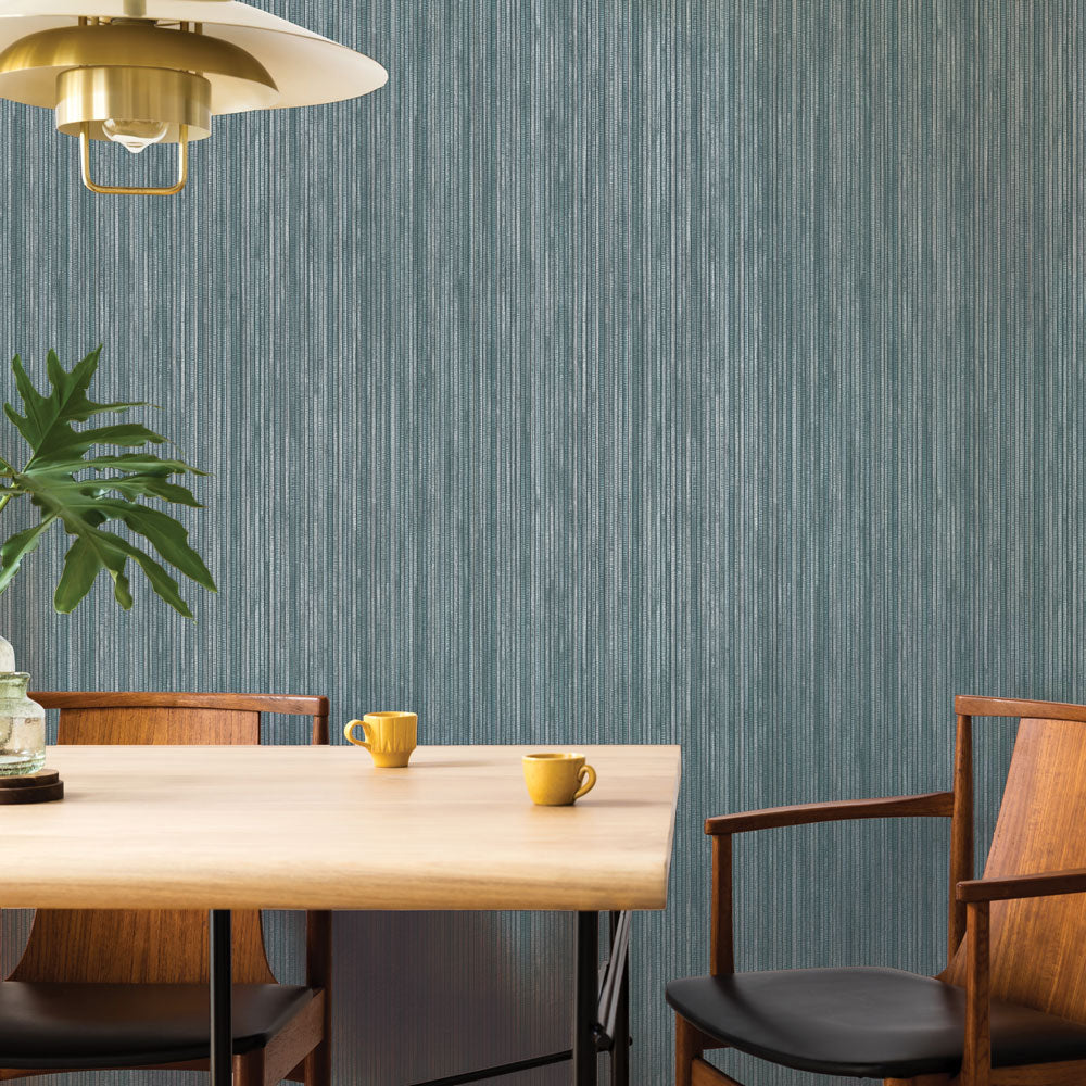 Faux Grasscloth Removable Wallpaper - Two wood chairs and a table in a room featuring Faux Grasscloth Peel And Stick Wallpaper in textured chambray | Tempaper#color_textured-chambray