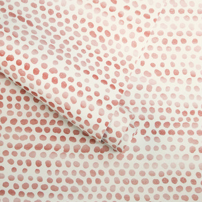 Moire Dots Removable Wallpaper - A roll of Tempaper's Moire Dots Peel And Stick Wallpaper in coral dots | Tempaper#color_coral-dots