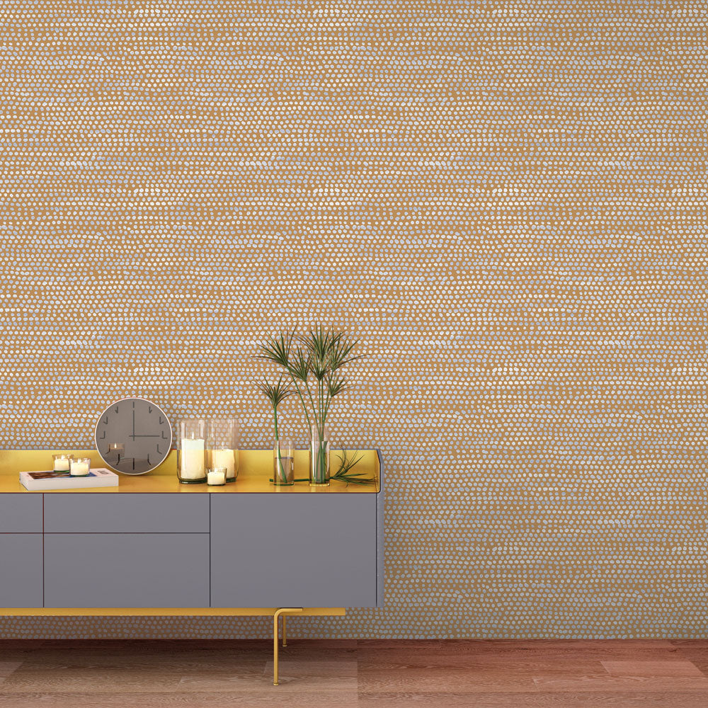 Moire Dots Removable Wallpaper - A grey sideboard with plants, a clock, and candles in a room featuring Tempaper's Moire Dots Peel And Stick Wallpaper in toasted turmeric dots | Tempaper#color_toasted-turmeric-dots