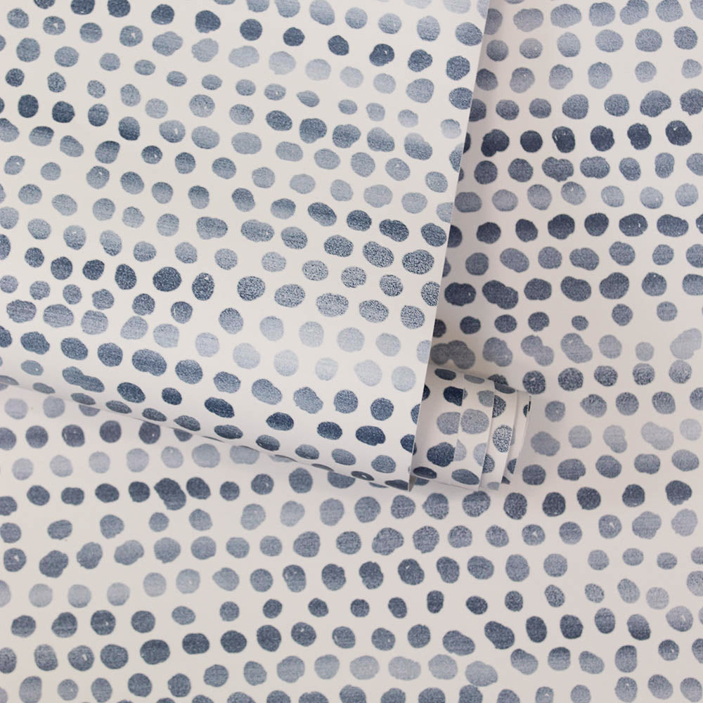 Moire Dots Removable Wallpaper - A roll of Tempaper's Moire Dots Peel And Stick Wallpaper in blue moon dots | Tempaper#color_blue-moon-dots
