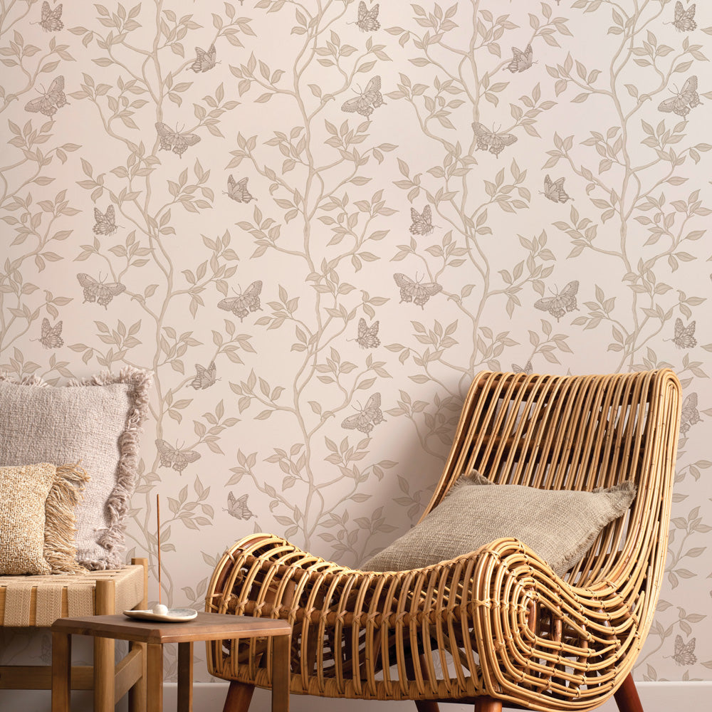 Monarch Non-Pasted Wallpaper - A tan chair in front of Monarch Unpasted Wallpaper in fawn | Tempaper#color_fawn