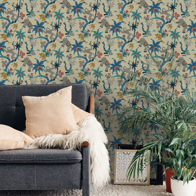 Monkey Business Removable Wallpaper By Novogratz - A grey couch with beige throw pillows and a couple of plants in a room featuring Monkey Business Peel And Stick Wallpaper By Novogratz in banana blossom | Tempaper#color_banana-blossom