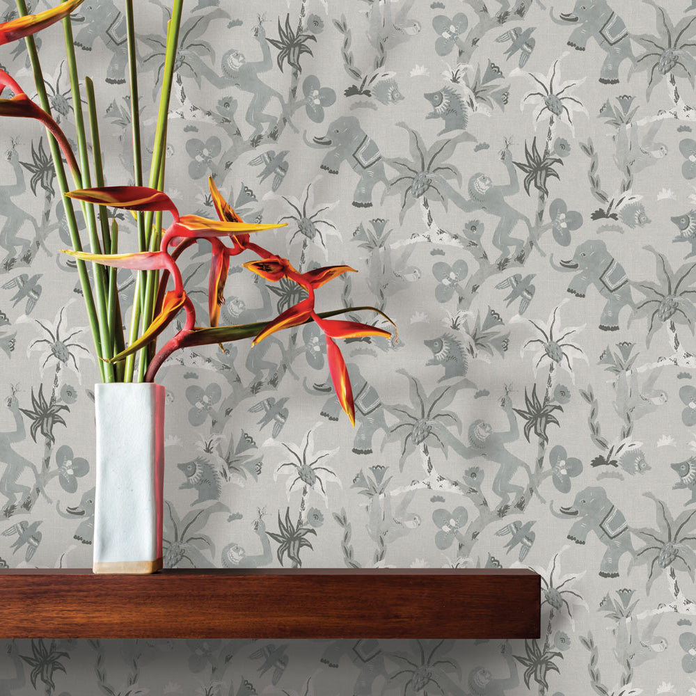 Monkey Business Removable Wallpaper by Novogratz - A wood shelf with a vase on top in a room featuring Monkey Business Peel And Stick Wallpaper by Novogratz in forest fog | Tempaper#color_forest-fog