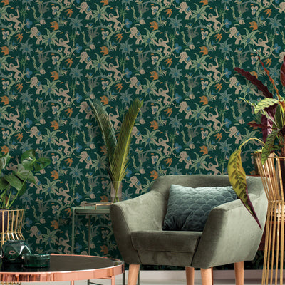 Monkey Business Removable Wallpaper By Novogratz - A green chair, rose gold table, and several plants in a room featuring Monkey Business Peel And Stick Wallpaper By Novogratz in jade parada | Tempaper#color_jade-parade