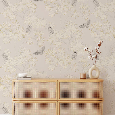 Parliament Non-Pasted Wallpaper - A tan dresser and a plant with Parliament Unpasted Wallpaper in natural beige | Tempaper#color_natural-beige
