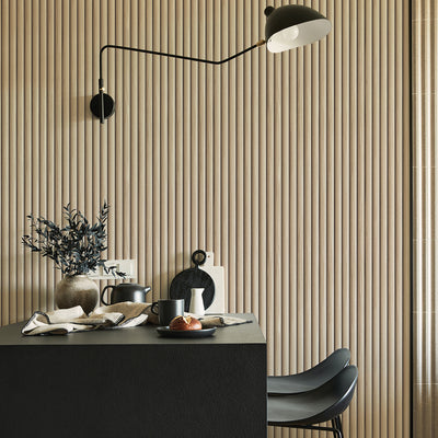 Reeded Wood peel and stick wallpaper in a dining room with a light fixture.