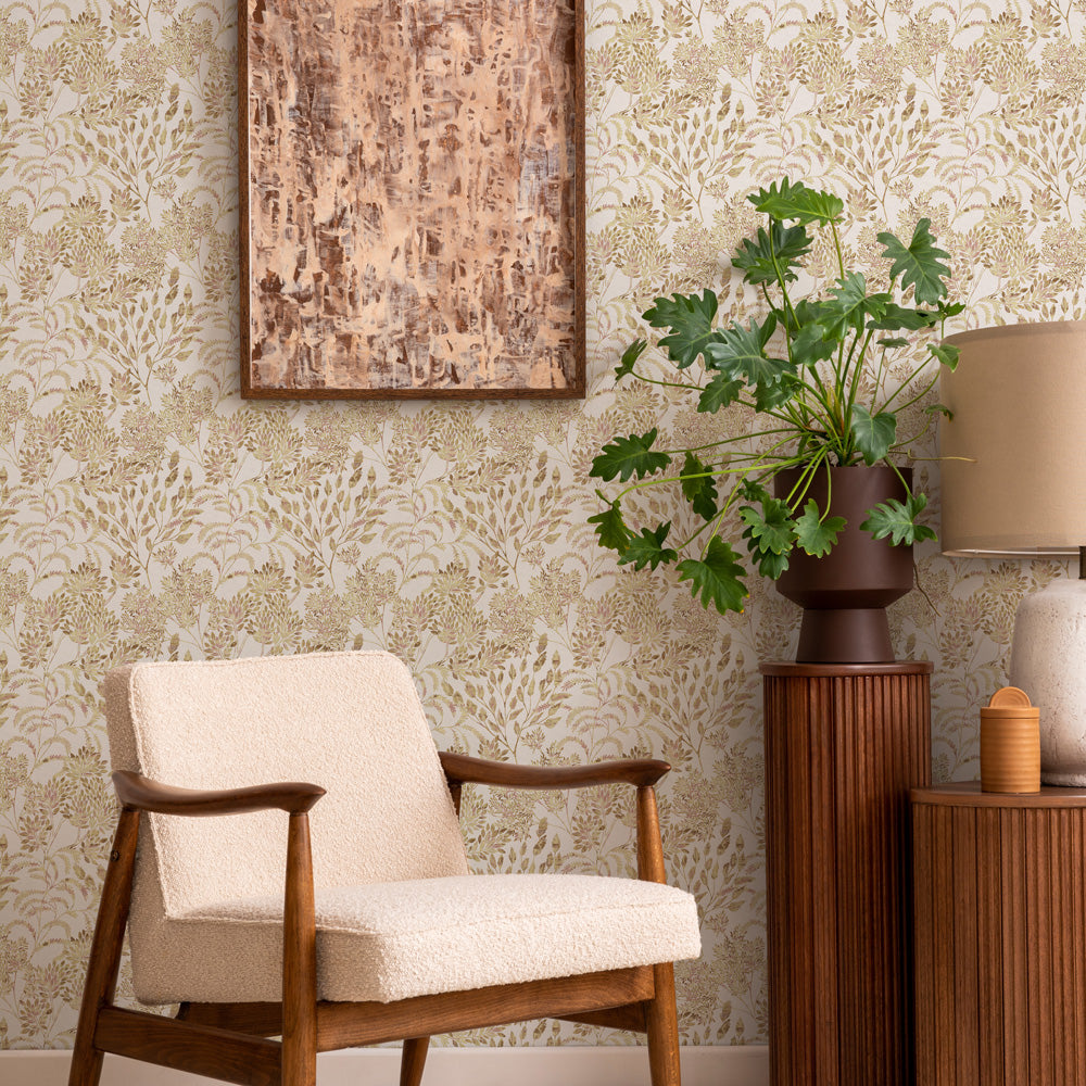 Stencil Foliage Non-Pasted Wallpaper - A chair and plant in front of Stencil Foliage Unpasted Wallpaper in golden wheat | Tempaper#color_golden-wheat