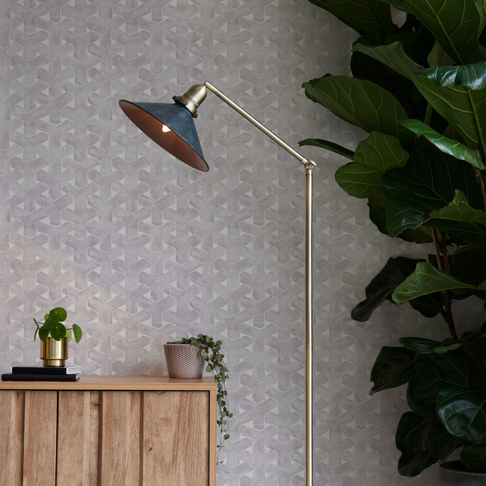 Grey trellis wallpaper print paired with a wooden console table #color_steel-grey