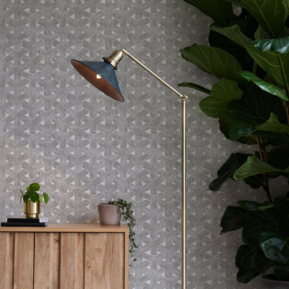 A charcoal trellis wallpaper print paired with a wooden console table #color_charcoal