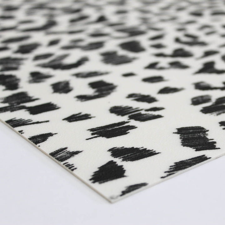 Corner view of the Animal Print Vinyl Rug.