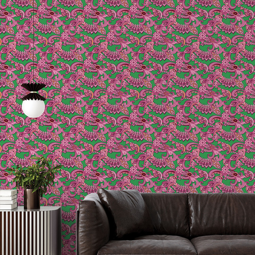 Tempaper's Full Look Peel And Stick Wallpaper By Alice + Olivia shown behind a couch and an end table with a plant on top.