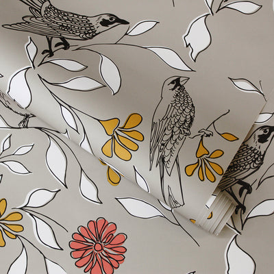 Slightly unraveled roll of Birds WALLPAPER in a griege colorway.