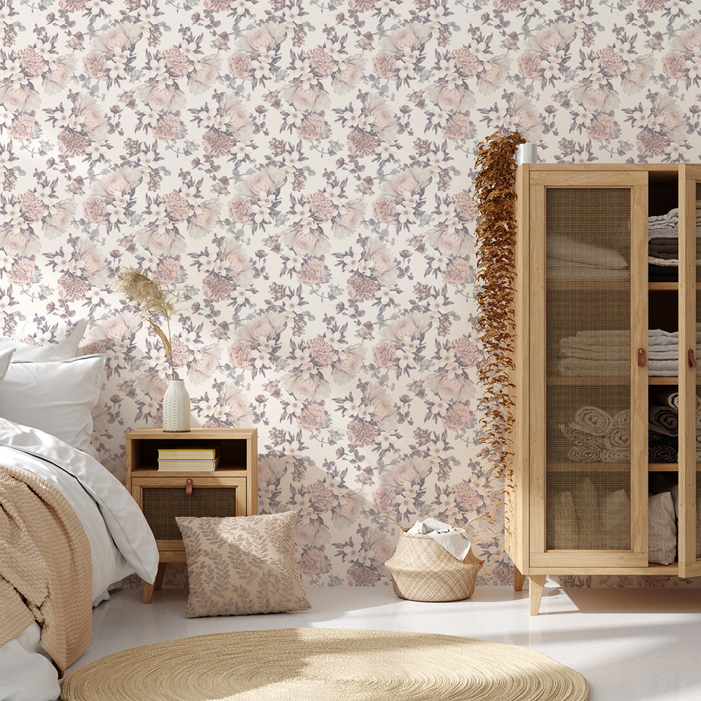 Botanical WALLPAPER in mauve pink displayed in a bedroom.