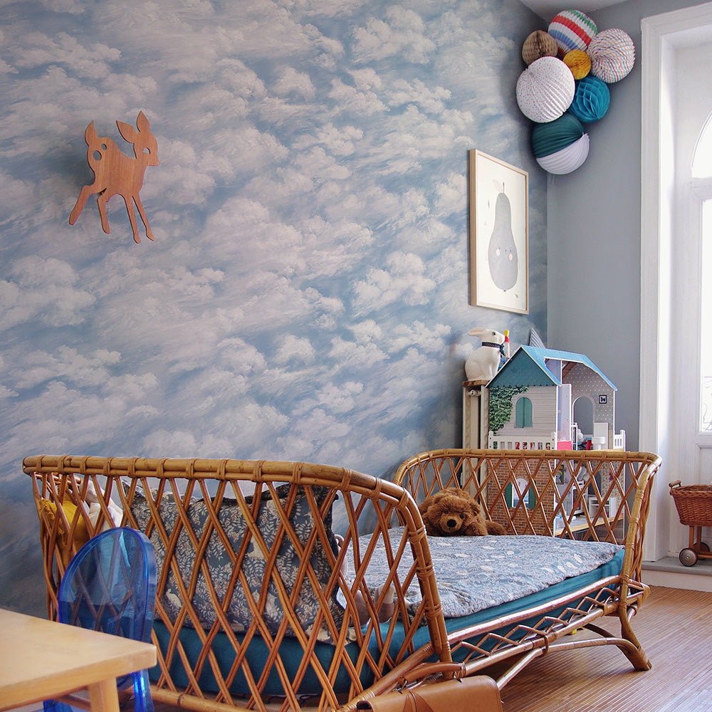 Tempaper's Clouds Peel And Stick Wallpaper in light blue.