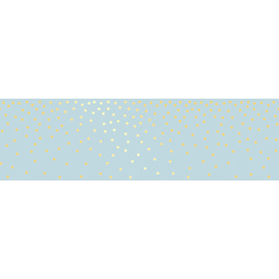 A strip of Tempaper's Falling Dots Border Peel And Stick Wallpaper.