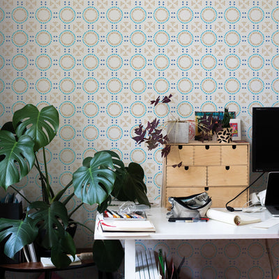 Breeze Tile peel and stick wallpaper displayed behind plants and a desk.