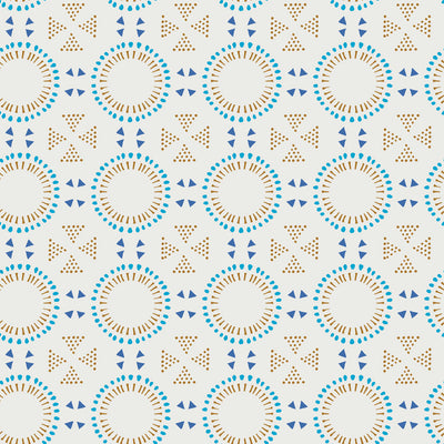 A dotted geo design with beige and bright blue, creating Tempaper's summer tan Breeze Tile peel and stick wallpaper.
