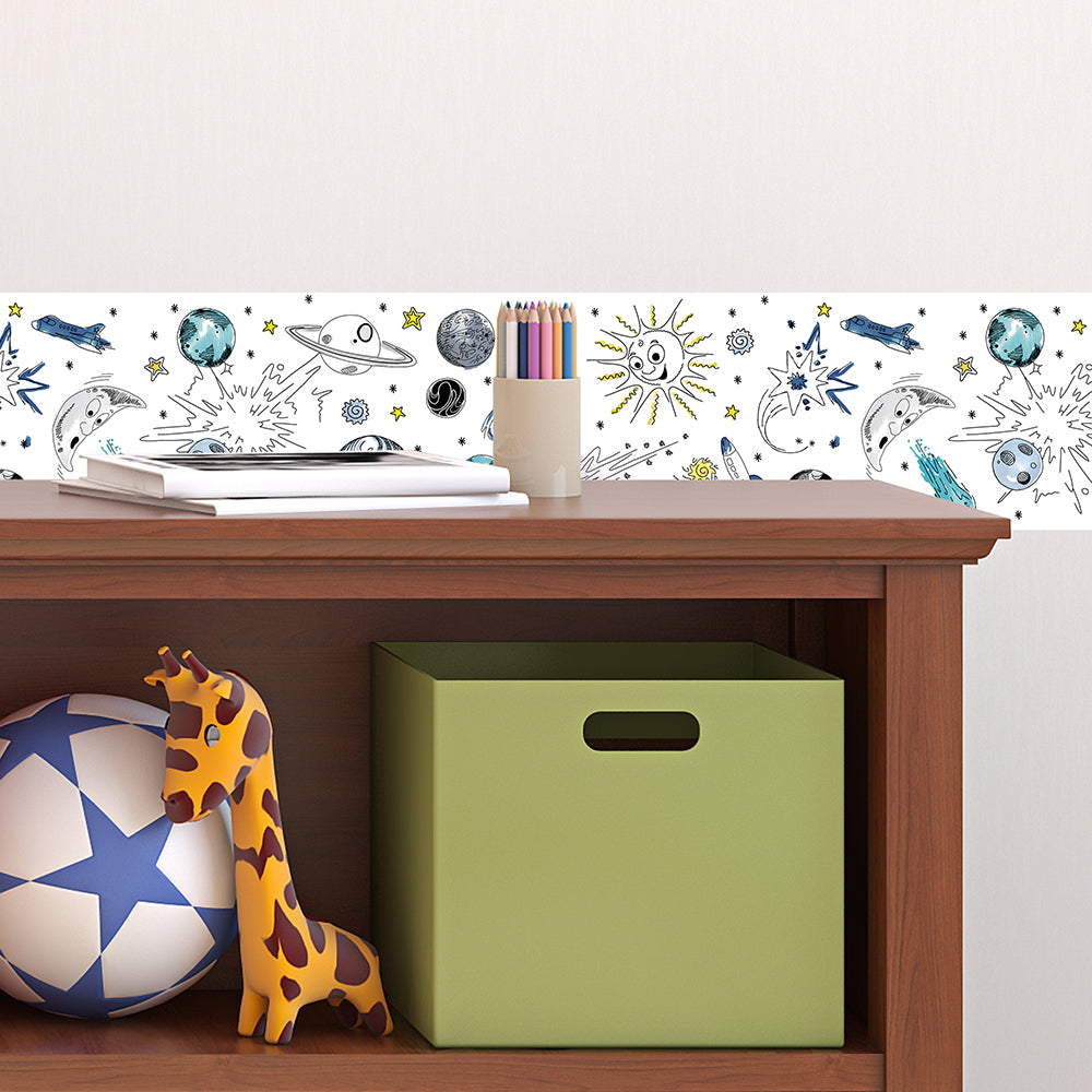 A strip of Tempaper's Galaxy Border Peel And Stick Wallpaper in white shown behind a bookcase.