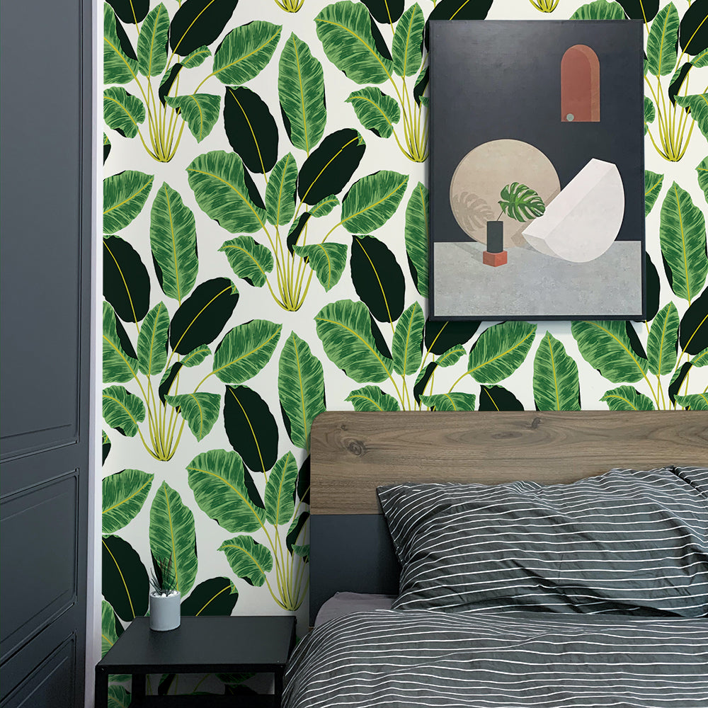 Hojas Cubanas Removable Wallpaper by Genevieve Gorder - A bedroom with a bed and black nightstand, featuring Hojas Cubanas Peel And Stick Wallpaper by Genevieve Gorder | Tempaper
