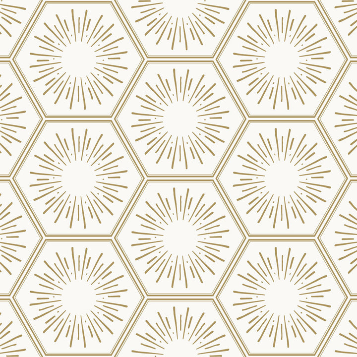 Repeating gold hexagons filled with sunbursts — a sample of Tempaper's sunset gold Hello Sunshine peel and stick wallpaper. #color_sunset-gold