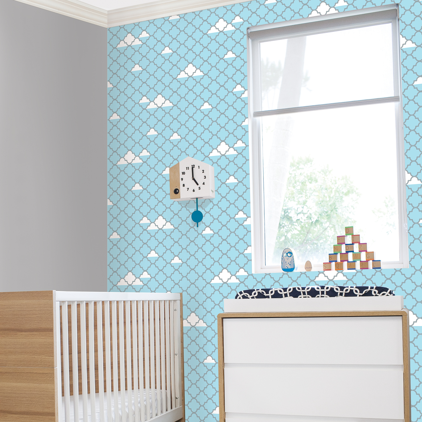Tempaper's Clouds Peel And Stick Wall Mural shown in a kids bedroom.