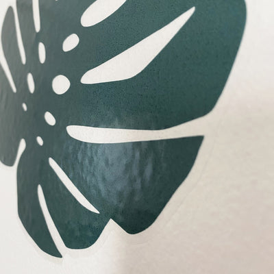 A zoomed in view of Tempaper's Graphic Palm Leaf Wall Decals.