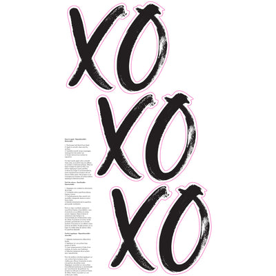 The packaging of black XOXO wall decals along with application instructions from Tempaper.