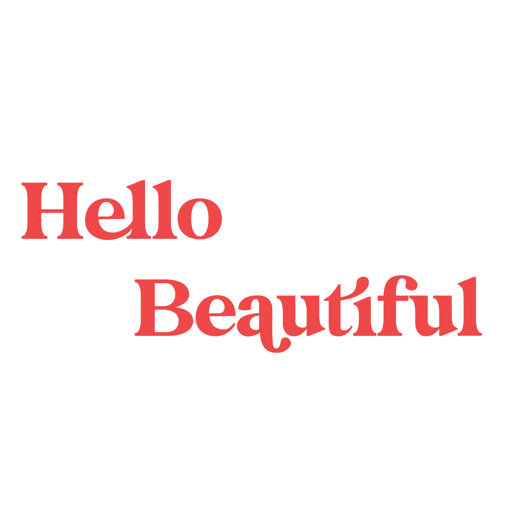 The words "hello beautiful" written in retro red font, available as Hello Beautiful wall decals from Tempaper.