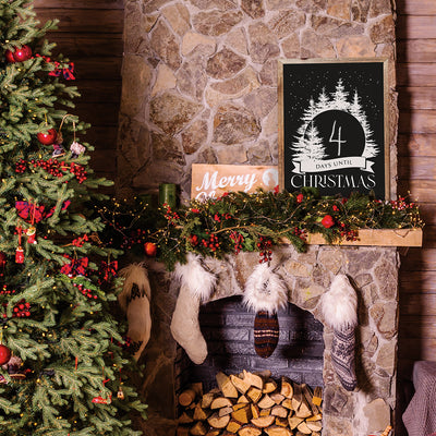 Tempaper's Christmas Countdown Wall Decal shown above a fireplace.