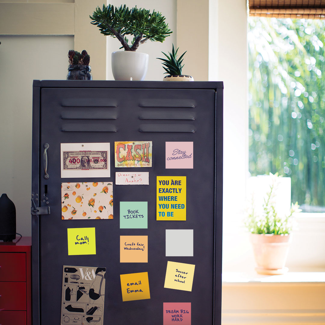 Tempaper's Dry Erase Sticky Notes Wall Decals shown on a locker.