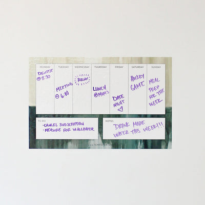 Tempaper Branded Weekly Calendar wall decal showing important events written with a dry erase marker.