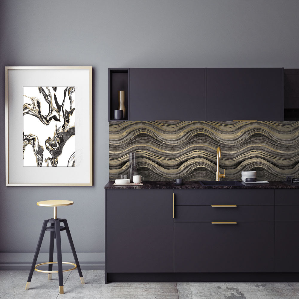 Travertine Removable Wallpaper - A kitchen with black cabinets and a backsplash featuring Tempaper's Travertine Peel And Stick Wallpaper | Tempaper