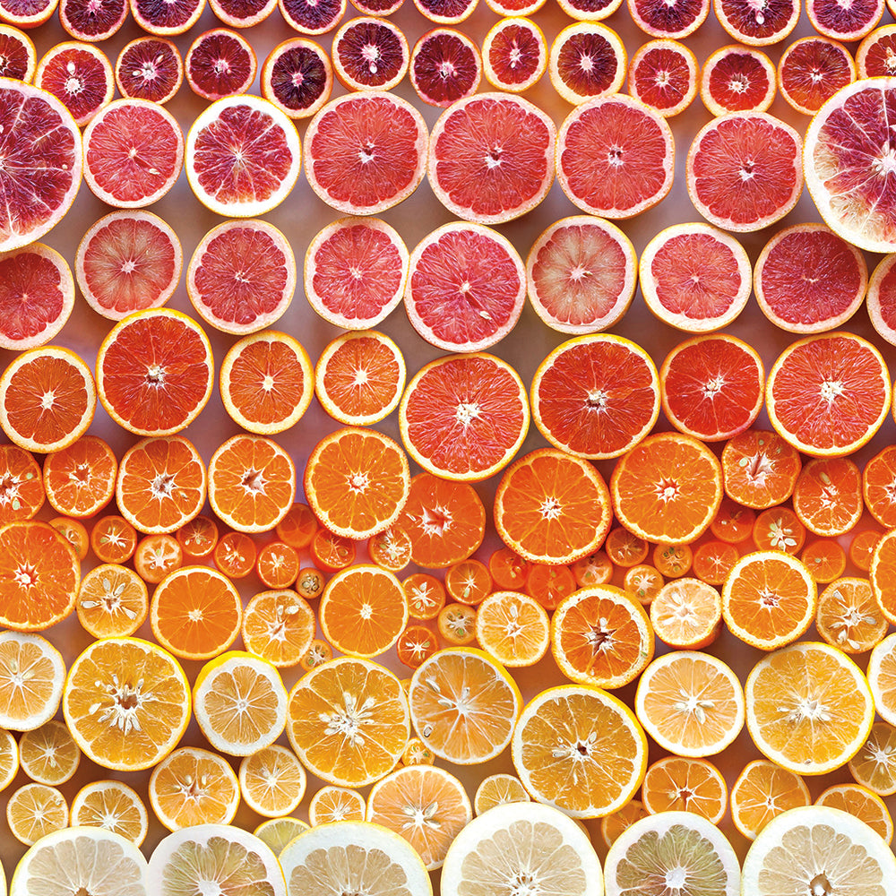 An up close swatch of Tempaper's Citrus Gradient Peel And Stick Wallpaper By Wright Kitchen.