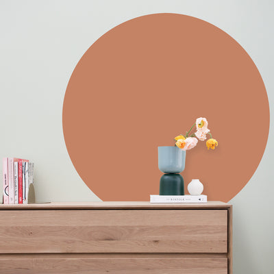 Tempaper's Circle Wall Decal shown above a dresser.